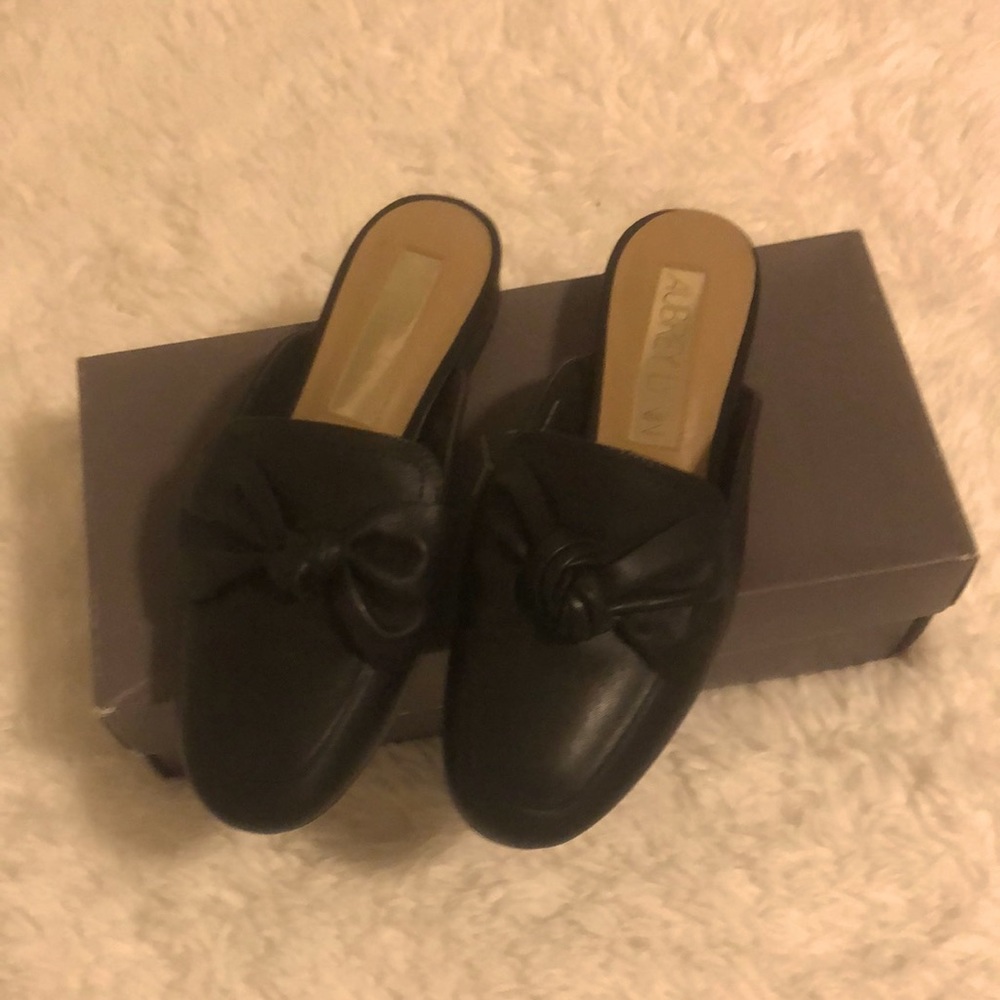 Like new black mules with bow.